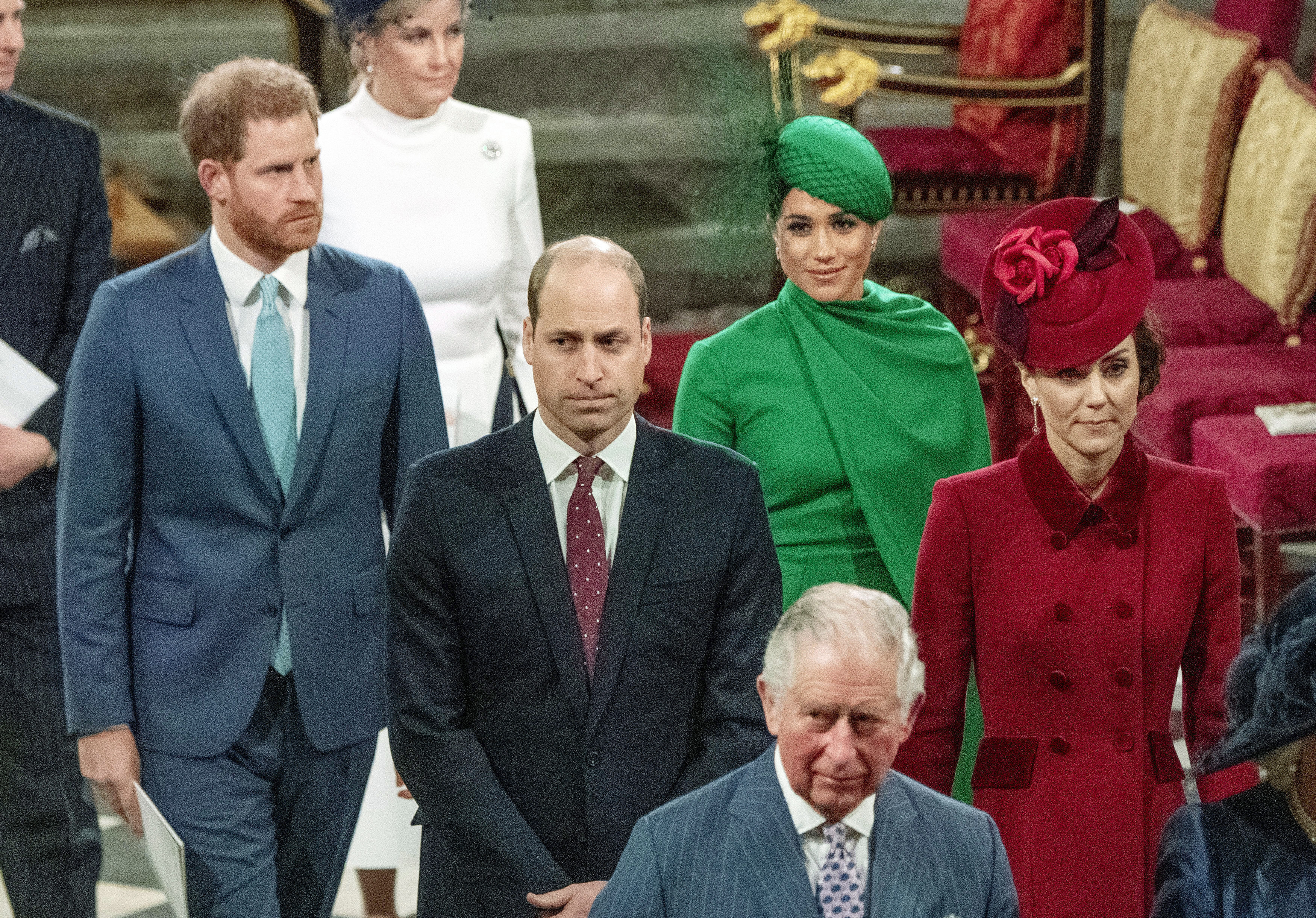 FILE - In this file photo dated Monday March 9, 2020, from back, Britain's Prince Harry and Meghan Duchess of Sussex, Prince William and Kate, Duchess of Cambridge, with Prince Charles, front, as the family members leave the annual Commonwealth Service at Westminster Abbey in London. Prince Charles has been preparing for the crown his entire life. Now, that moment has finally arrived. Charles, the oldest person to ever assume the British throne, became king on Thursday Sept. 8, 2022, following the death of his mother, Queen Elizabeth II. (Phil Harris/Pool via AP, File)