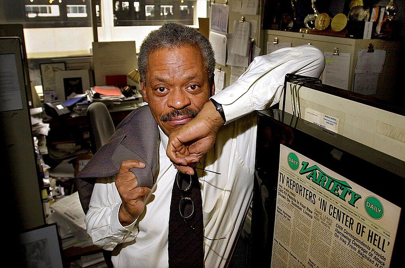 CNN anchor Bernard Shaw poses in his office at CNN's Washington bureau in this Feb. 15, 2001 file photo. (AP/Alex Brandon)