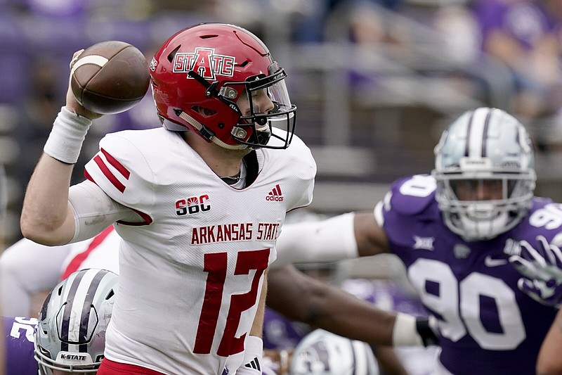 Logan Bonner threw for 204 yards and two touchdowns in Arkansas State’s 35-31 victory at Kansas State in 2020. That game is an example of one of the times the Red Wolves, who play today at No. 3 Ohio State, have managed victories against power-conference opponents.
(AP/Charlie Riedel)