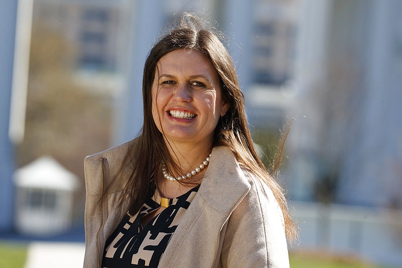 Sarah Huckabee Sanders stands in front of the White House in Washington in this March 8, 2017 file photo. (AP/Evan Vucci)