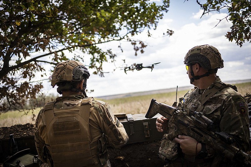 Ukrainian soldiers operate a drone Saturday in the Kherson region of Ukraine.
(The New York Times/Jim Huylebroek)