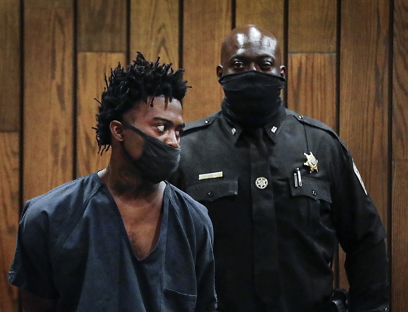 Ezekeil Kelly, left makes his first court appearance on Friday, Sept. 9, 2022 in Memphis, Tenn. Kelly is  accused of killing four people and wounding three others in a livestreamed shooting rampage that paralyzed Memphis and led to a city-wide manhunt.  (Mark Weber/Daily Memphian via AP)