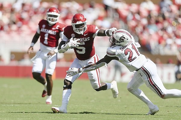 Arkansas running back Raheim Sanders (5) carries the ball during a game against South Carolina on Saturday, Sept. 10, 2022, in Fayetteville.