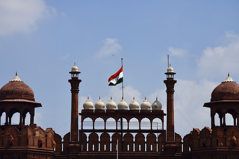 The Indian flag flies at half-mast on Sunday at the historic Red Fort in New Delhi, India following Thursday’s death of Britain’s Queen Elizabeth II.
(AP/Manish Swarup)