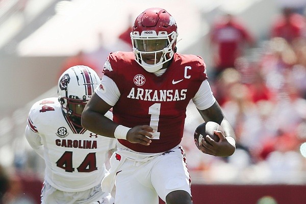 Arkansas quarterback KJ Jefferson carries the ball on Saturday, September 10, 2022, during the second quarter of a football game at Donald W. Reynolds Razorback Stadium in Fayetteville.