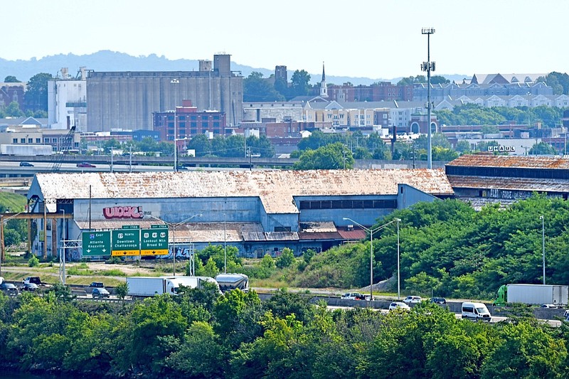 Staff File Photo by Robin Rudd / Interstate 24 winds past the former U.S. Pipe/Wheland Foundry site on June 14, 2022. The former foundry property is the location of a proposed massive redevelopment including a new Chattanooga Lookouts stadium.