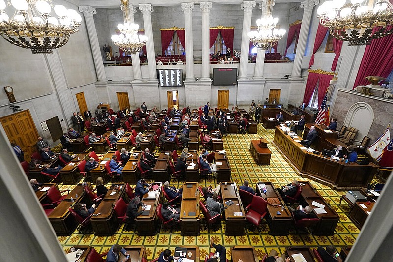 FILE - The Tennessee House of Representatives meets Oct. 27, 2021, in Nashville, Tenn.  Tennessee state staffers watched intently this summer while local school officials voted down a contentious Hillsdale College-linked charter school. According to public records, the staffers were aware their state commission would likely be in the tight spot soon of deciding whether to let the school open anyway. (AP Photo/Mark Humphrey, File)