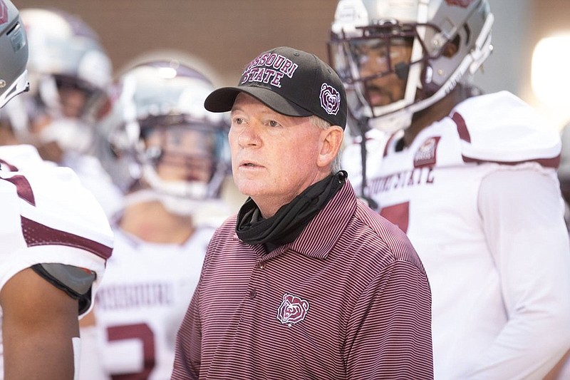 Missouri State head coach Bobby Petrino gets his players ready for their game against against UCA Saturday night at Estes Stadium in Conway (Arkansas Democrat-Gazette/Justin Cunningham)