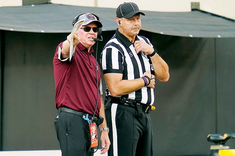 In this Sept. 4, 2021, file photo, Missouri State coach Bobby Petrino talks with an official during the first half of a game against Oklahoma State in Stillwater, Okla. (Associated Press)