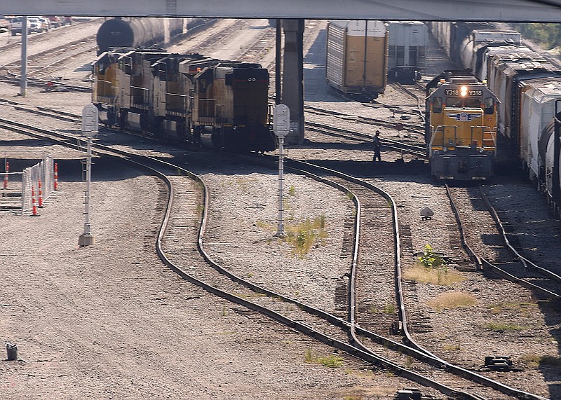Trains move through the Union Pacific rail yard in North Little Rock on Thursday. Union Pacific officials praised the deal with rail workers in a statement, saying, “We look forward to the unions ratifying these agreements and working with employees as we focus on restoring supply chain fluidity.”
(Arkansas Democrat-Gazette/Thomas Metthe)