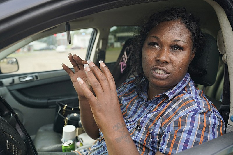 Jackson, Miss., resident Carey Wooten says the water in her kitchen still smells bad, but not as bad as before when even one of her dogs wouldn’t touch it.
(AP/Rogelio V. Solis)