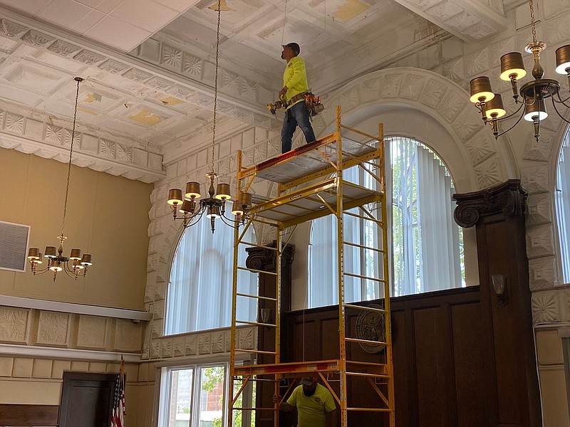 Workers with T&J Speciality Contractors add a ‘drop’ ceiling in Benton County Circuit Judge Robin Green’s courtroom on Sept. 9. (NWA Democrat-Gazette/Tracy Neal)
