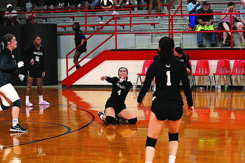 Smackover's Ingrid Reis makes a dig on a shot in action this season at Norphlet. Reis, a senior exchange student from Brazil, brings experience and spirit to the Lady Bucks' first volleyball squad.