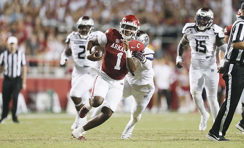 Arkansas quarterback KJ Jefferson (1) carries the ball, Saturday, September 17, 2022 during the third quarter of a football game at Donald W. Reynolds Razorback Stadium in Fayetteville. Visit nwaonline.com/220918Daily/ for today's photo gallery...(NWA Democrat-Gazette/Charlie Kaijo)