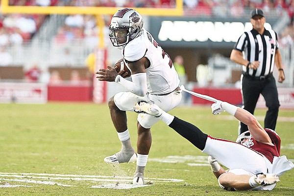 No. 10 Arkansas holds off Petrino, Missouri State