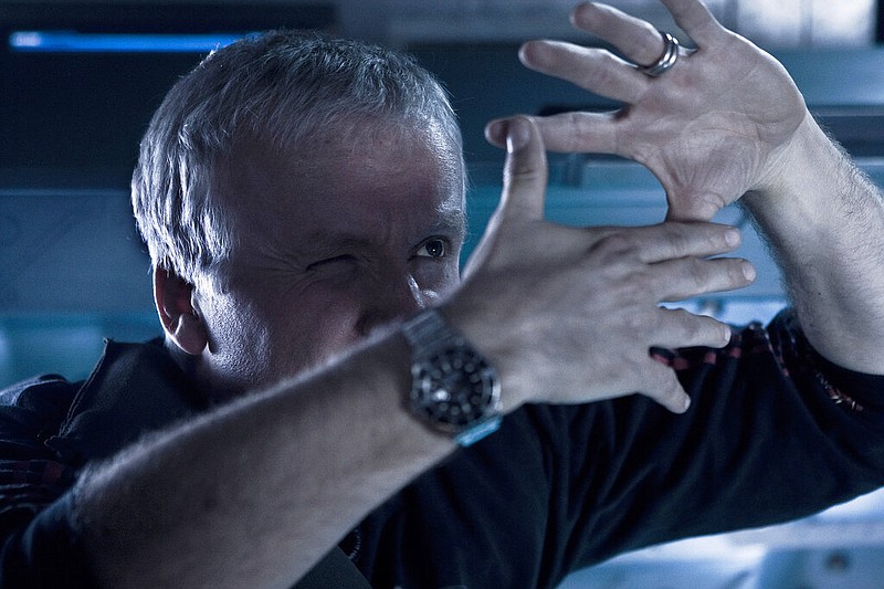 This 2009 image released by 20th Century Films shows filmmaker James Cameron on the set of "Avatar."  Cameron's long-awaited "Avatar" sequel, "The Way of the Water" will be released later this year.  On Friday, â€œAvatarâ€ will be re-released in theaters. (Zack Fellman/20th Century Films via AP)