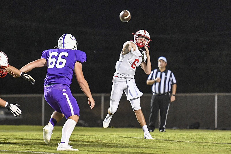 Owen Miller (6) of Harding Academy passes, Friday, Sept. 16, 2022, during the second quarter of the Wildcats’ 44-14 win over Booneville at Bearcat Stadium in Booneville. Visit nwaonline.com/220917Daily/ for today's photo gallery..(NWA Democrat-Gazette/Hank Layton)