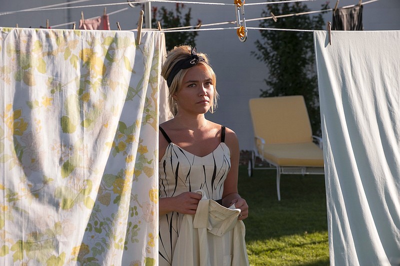 Stepfordian housewife Alice Chambers (Florence Pugh) lives with her seemingly perfect husband in a 1950s utopian experimental community that’s hiding a dark secret in Olivia Wilde’s “Don’t Worry Darling.”