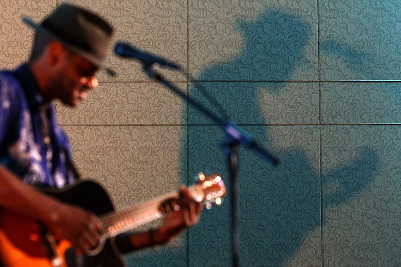 Staff file photo / Rick Rushing performs during the 2018 Chattanooga Tourism Summit at the Chattanooga Convention Center. He and his band, The Blues Strangers, will launch the Campfire Concert Series at Reflection Riding Arboretum & Nature Center on Sept. 30. Attendees have the option of camping overnight.