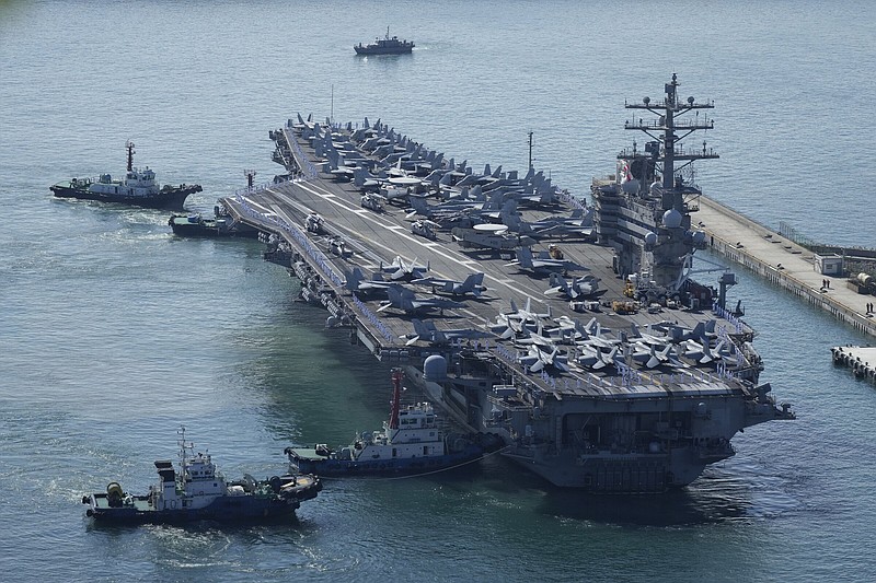 The USS Ronald Reagan, arriving Friday in Busan, South Korea, will be the first aircraft carrier to take part in joint drills with South Korea since 2017.
(AP/Lee Jin-man)