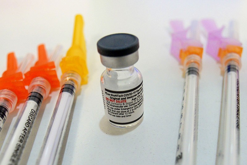 Booster shots of the Pfizer COVID-19 vaccine are displayed during a vaccine clinic in Townshend, Vt., on Tuesday, Sept. 20, 2022. (Kristopher Radder/The Brattleboro Reformer via AP)