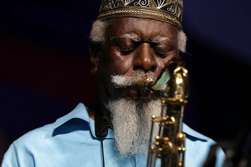 FILE - Jazz saxophonist Pharoah Sanders performs at the New Orleans Jazz and Heritage Festival in New Orleans, Friday, May 2, 2014. (AP/Gerald Herbert, File)