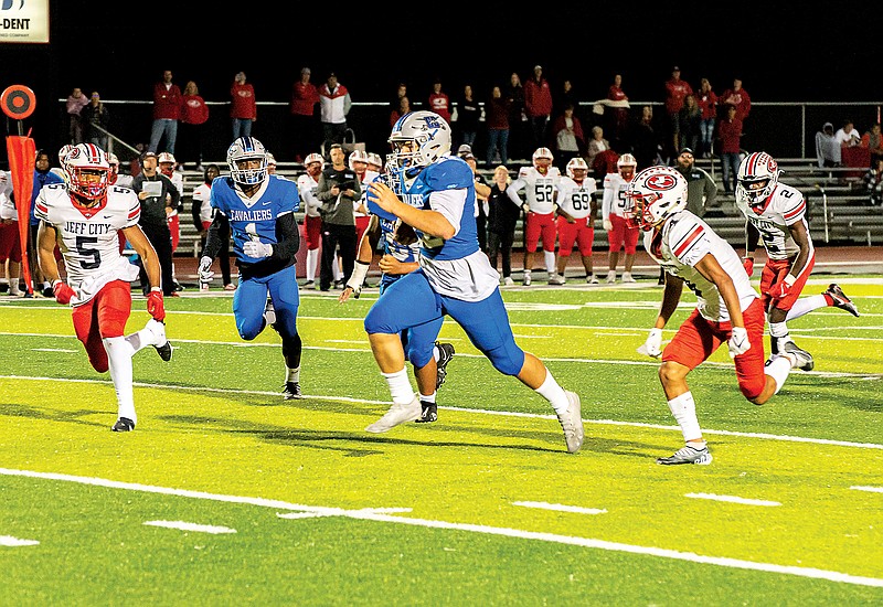 Capital City's Hurley Jacobs breaks loose for a 45-yard touchdown run during Friday night’s game against Jefferson City at Adkins Stadium. (Ken Barnes/News Tribune)