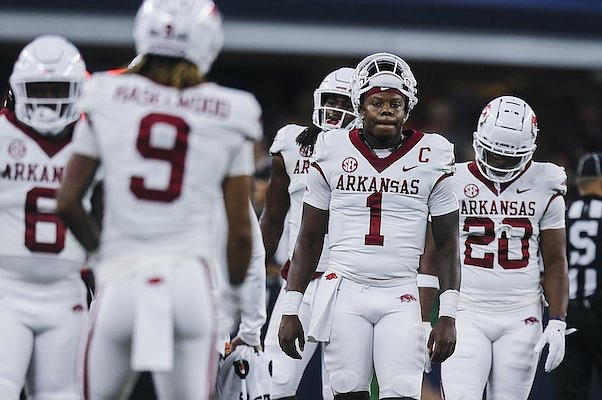 Arkansas quarterback KJ Jefferson (1) walks toward the sideline during a game against Texas A&M on Saturday, Sept. 24, 2022, in Arlington, Texas.