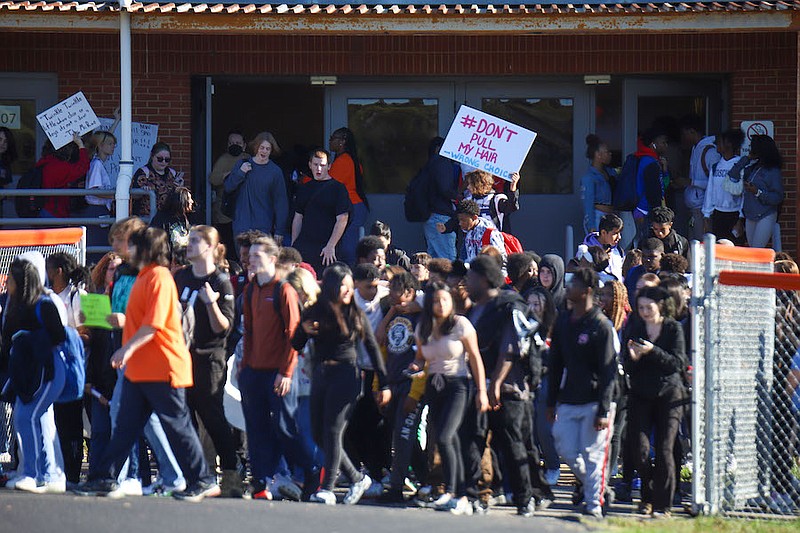 Staff photo by Olivia Ross / Students head back out to the football field to protest during a walkout at East Ridge High School on Friday, Sept. 23, 2022, in protest of the forceful arrest of Tauris Sledge by the school’s resource officer.