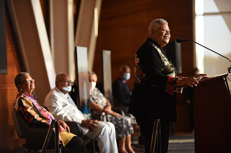 Minnijean Brown-Trickey (right) speaks Sunday, Sept. 25, 2022 during the ceremony honoring her and the other members of the Little Rock Nine at the Clinton Presidential Center in Little Rock..(Arkansas Democrat-Gazette/Staci Vandagriff)