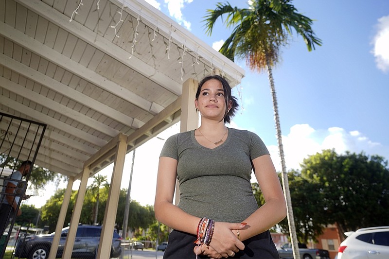 Adismarys Abreu, 16, poses for a photo at her home, Tuesday, Aug. 23, 2022, in Miami. Abreu had been discussing a long-lasting birth control implant with her mother for about a year as a potential solution to increasing menstrual pain. Then Roe v. Wade was overturned, and Abreu joined the throng of teens rushing to their doctors as states began to ban or severely limit abortion. (AP Photo/Wilfredo Lee)