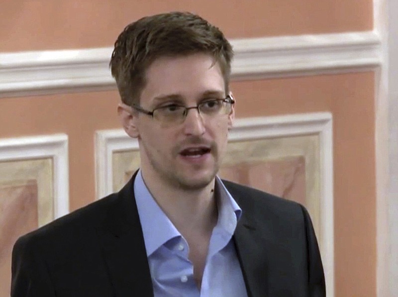 In this image made from video and released by WikiLeaks, former National Security Agency systems analyst Edward Snowden speaks in Moscow, Oct. 11, 2013. President Vladimir Putin has granted Russian citizenship to former U.S. security contractor Edward Snowden, according to a decree signed by the Russian leader on Monday Sept. 26, 2022. (AP Photo, File)