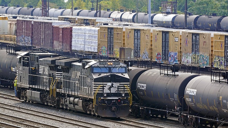 FILE - Norfolk Southern locomotives work in the in the Conway Terminal on Sept. 15, 2022, in Conway, Pa. The railroad union that rejected its deal with the nation's freight railroads earlier this month even though it offered 24% raises now has a new tentative agreement, but officials cautioned that the contract dispute won't be fully settled until all 12 rail unions approve their agreements this fall. (AP Photo/Gene J. Puskar, File)