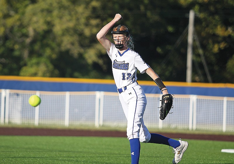 Capital City pitcher Lydia Coulson delivers the ball to the plate during Monday’s game against Camdenton at Capital City High School. (Greg Jackson/News Tribune)