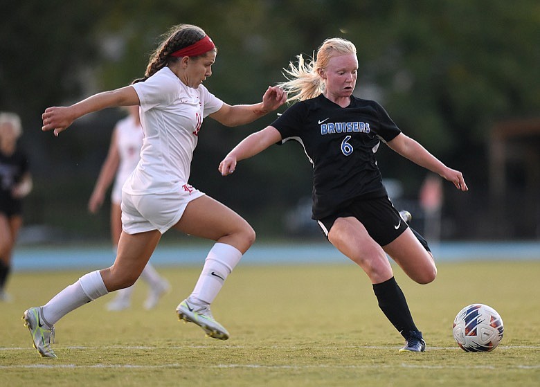 Staff photo by Matt Hamilton / Baylor (24) Lilly Catalanotto defends as GPS (6) Kallie West kicks the ball at Girls Preparatory School on Wednesday, September 28, 2022.