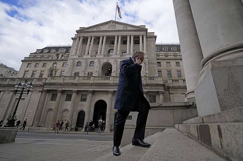 A man walks up the stairs of the Bank of England in London on Wednesday. The bank started a temporary bond-buying program Wednesday as it takes emergency action to prevent “material risk” to the nation’s financial stability.
(AP/Frank Augstein)