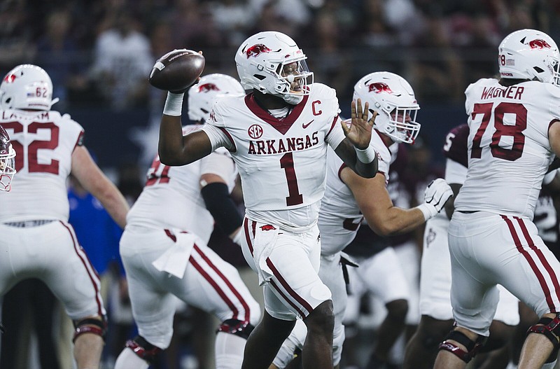Arkansas quarterback KJ Jefferson (1) passes, Saturday, September 23, 2022 during the first quarter of a football game at AT&T Stadium in Arlington, Texas. Visit nwaonline.com/220924Daily/ for today's photo gallery...(NWA Democrat-Gazette/Charlie Kaijo)