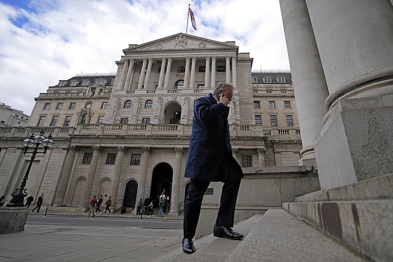 A man walks up the stairs in front of the Bank of England in London, Wednesday, Sept. 28, 2022. (AP/Frank Augstein)