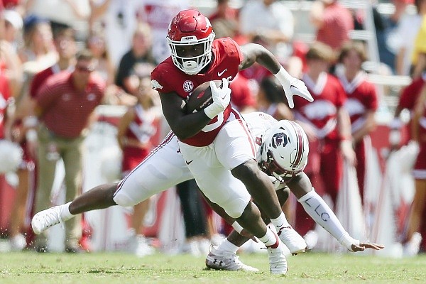 Arkansas running back Rashod Dubinion (6) carries the ball, Saturday, September 10, 2022 during the fourth quarter of a football game at Donald W. Reynolds Razorback Stadium in Fayetteville.