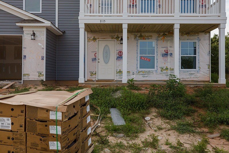 A “sold” sign is placed in the window of a home under construction in the Ellerbe Estates subdivision in Dalzell, S.C., in this file photo.
(Bloomberg News WPNS/Micah Green)