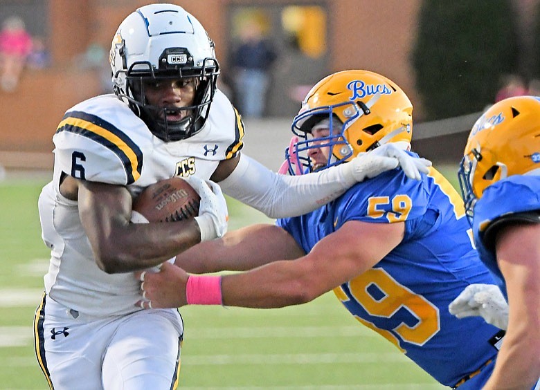 Staff photo by Robin Rudd / Chattanooga Christian's Boo Carter breaks away from Boyd Buchanan's Ty Barnes during Thursday night's game.