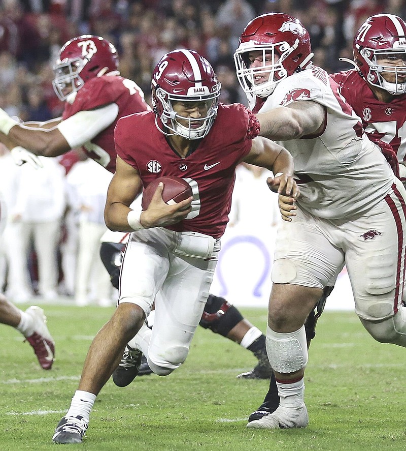 Alabama quarterback Bryce Young, shown against Arkansas last season in a game when he had 559 passing yards and five touchdowns, will again prove to be a challenge for the No. 20 Razorbacks when they take on the No. 2 Crimson Tide on Saturday in Fayetteville.
(NWA Democrat-Gazette/Charlie Kaijo)