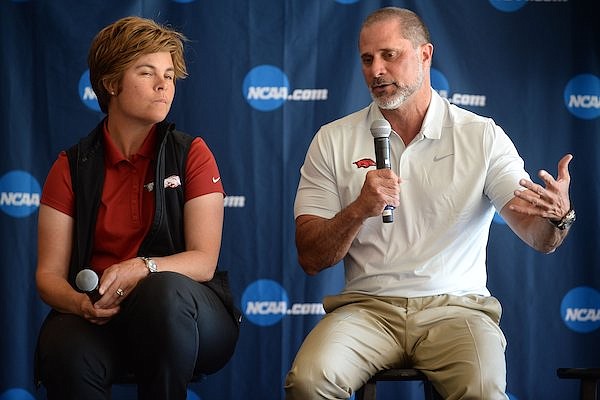 Brad McMakin (right), Arkansas men's golf coach, speaks Tuesday, April 9, 2019, alongside Shauna Taylor, Arkansas women's golf coach, during a press conference at Blessings Golf Club in Johnson.