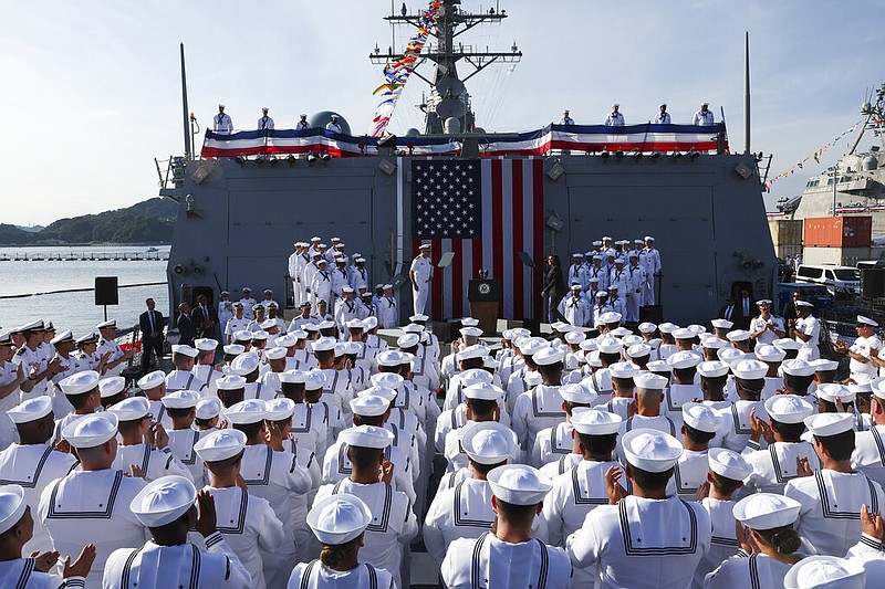 U.S. Vice President Kamala Harris walks up to deliver remarks during her visit to the USS Howard at Yokosuka Naval Base in Yokosuka, south of Tokyo, on Wednesday, Sept. 28, 2022. (Leah Millis/Pool Photo via AP)