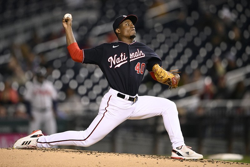 Washington Nationals starting pitcher Josiah Gray throws during the third inning of the team's baseball game against the Atlanta Braves, Wednesday, Sept. 28, 2022, in Washington. (AP Photo/Nick Wass)