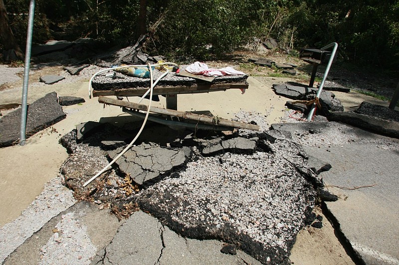 A damaged camping area in the Albert Pike Campground in Montgomery County is seen in this June 14, 2010 file photo. Monday. A flash flood of the Little Missouri River on June 11, 2010, caused the drowning of at least 20 people near the campground. (Arkansas Democrat-Gazette file photo)