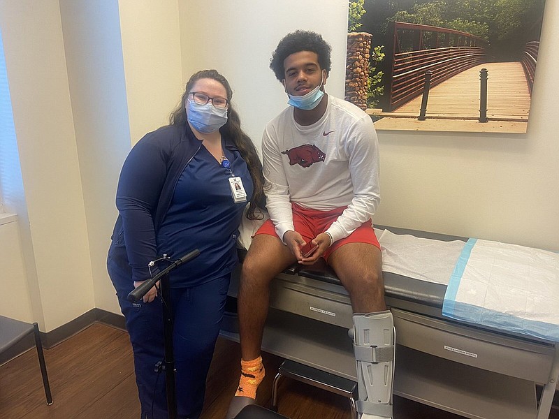 University of Arkansas 4-star quarterback commitment Malachi Singleton (right) of Kennesaw (Ga.) North Cobb High School found an unexpected fan in certified clinical medical assistant Katie O’Reilly following a recent foot surgery. O’Reilly, an Arkansas fan who moved to Georgia from New York four years ago, said she “was star struck” meeting Singleton.
(Photo courtesy Margaret Singleton)
