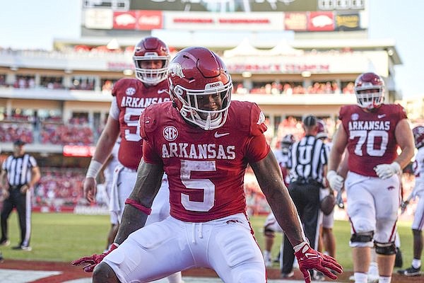 Arkansas running back Raheim Sanders (5) celebrates a touchdown during a game against Alabama on Saturday, Oct. 1, 2022, in Fayetteville.