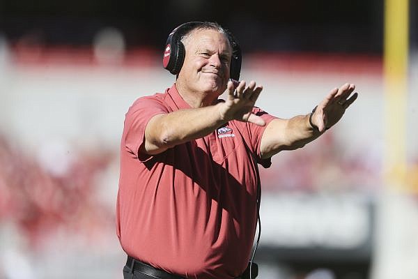 Arkansas head coach Sam Pittman gestures an offensive pass interference on Alabama, Saturday, October 1, 2022 during the second quarter of a football game at Donald W. Reynolds Razorback Stadium in Fayetteville.
