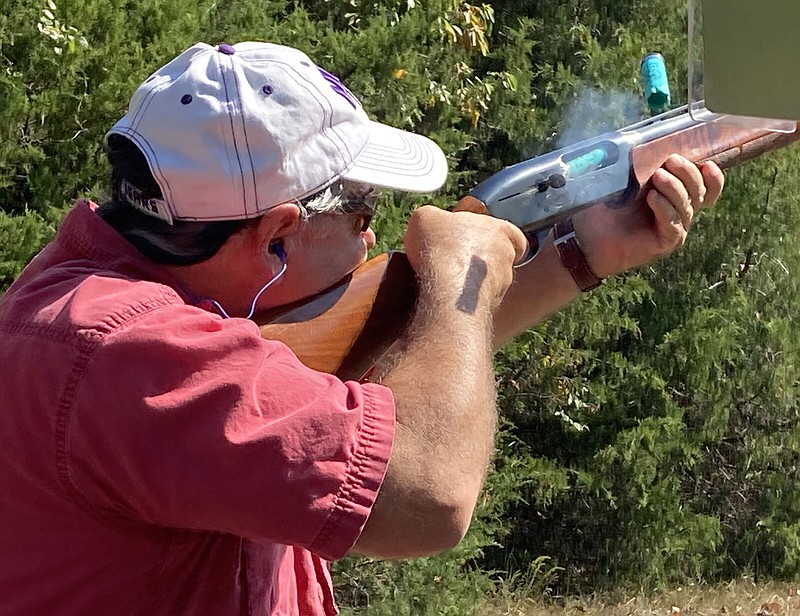 The author blazes away at clay targets during Shoot for the Cure on Sept. 23 at Remington Gun Club near Lonoke.
(Arkansas Democrat-Gazette/Bryan Hendricks)